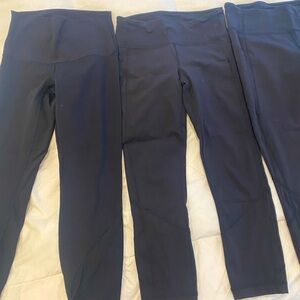 Lululemon size 2, 23 length. THREE PAIRS. good condition. No pulling or flaws.